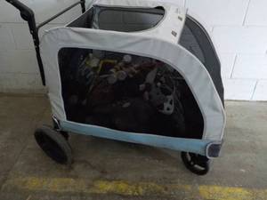 lot 124 image: Zhuakece Pet Stroller with all cont...