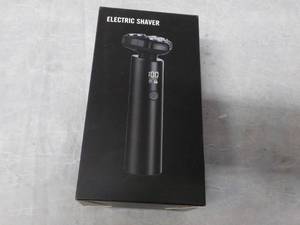lot 271 image: Electric Shaver...