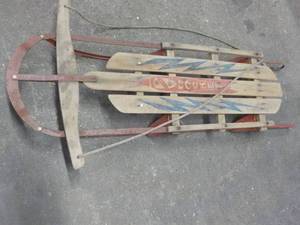 lot 209 image: Rocket Metal and Wood Sled...