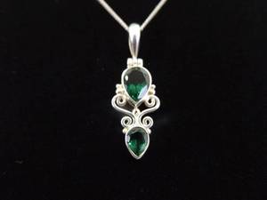 lot 8 image: .925 Sterling Silver Faceted Emerald Crystal Pendant Necklace