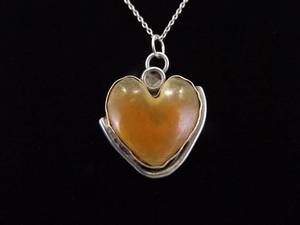 lot 18 image: .925 Sterling Silver Primitive Carnelian Heart Pendant Necklace