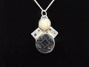 lot 24 image: .925 Sterling Silver Primitive Carved Moon Face Pendant Necklace