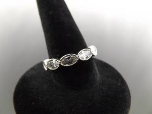 lot 82 image: .925 Sterling Silver Zirconia Band Ring Size 6