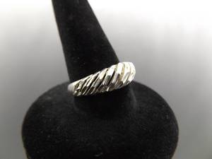 lot 86 image: .925 Sterling Silver Styled Band Ring Size 6.75