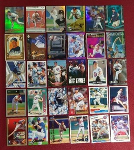 lot 164 image: (30) Greg Maddux Cards