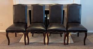 lot 27 image: K - Set of Four Pier 1 Imports Dark Brown Leather Dining Chairs