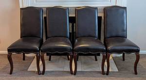lot 28 image: K - Set of Four Pier 1 Imports Dark Brown Leather Dining Chairs
