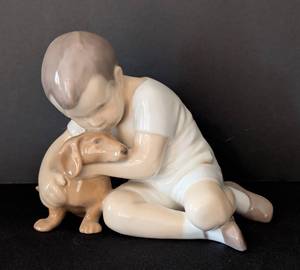 lot 43 image: Bing & Grondahl Porcelain Figurine - Boy Kissing a Dog