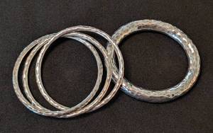 lot 48 image: K - Sterling Silver Hammered Bangles - Mexico 925 (Lot of 5)