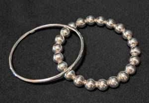 lot 103A image: K - Sterling Silver Bracelets - Beaded Ball & Plain Bangle - 55g Total - Largest 3in Dia (Lot of 2)