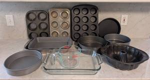 lot 163 image: LR - Bakeware Assortment - Muffin Pans, Cake Pans, Bundt Pan & Pyrex Dish