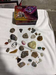 lot 1233 image: Assorted Stones, Minerals & Pok�mon Tin