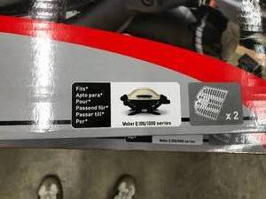 lot 189 image: NEW, WEBER GRILL GRATES,  #7644, FITS WEBER Q1001000 SERIES