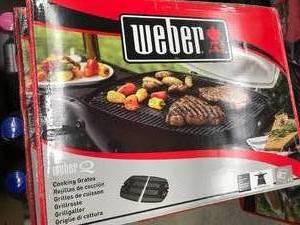 lot 186 image: NEW, WEBER GRILL GRATES,  #7646, FITS WEBER Q3003000 SERIES