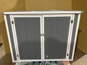 lot 43 image: Outsunny Storage Shed with Front & Lift-Up Doors, Double-Layer Resin, Lockable Latch for Outdoor, Gray (Used, Missing 1 Nut Hardware)