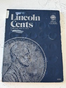 lot 12 image: Lincoln Cents and Book