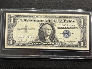 lot 51 image: 1957 B Blue Seal $1 Dollar Silver Certificate