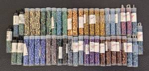 lot 3 image: Collection of 40 Colorful Cube Glass Bead Tubes