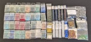 lot 8 image: Collection of 45 Packs of Cube Beads Assorted Colors and Sizes