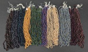 lot 15 image: Lot of 13 Bundles of Glass Seed Bead Strings - 6 Strands Per Bundle