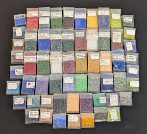 lot 26 image: Collection of 60 Toho and Miyuki Seed Bead Packs Assorted Colors