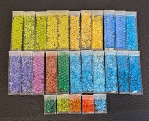 lot 40 image: Collection of 27 Assorted Bead Tubes in Various Colors