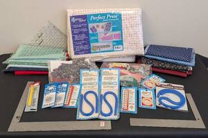 lot 44 image: Quilting Fabric Bundle with Tools and Pre-Cut Triangles