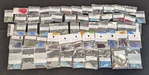 lot 57 image: Collection of 50 Packs Czech and Swarovski 3mm & 4mm Faceted Beads