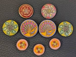 lot 59 image: Set of 9 Assorted Czech Glass Buttons with Floral and Peacock Designs