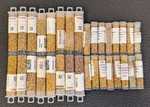 lot 64 image: Collection of 30 Gold Tone Seed Bead Tubes