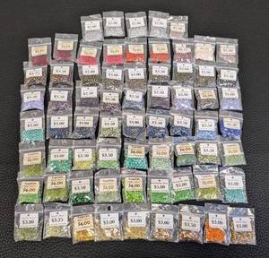 lot 98 image: Collection of 60 Packs Firepolish Beads Assorted Colors and Sizes