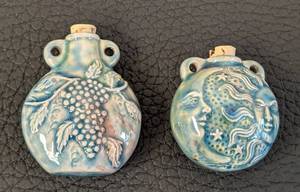 lot 102 image: Pair of Ceramic Bottle Pendants with Grapes and Celestial Designs