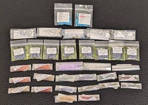 lot 109 image: Collection of 30 Packs Swarovski Crystal Beads Assorted Colors and Sizes