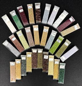 lot 32H image: W - Collection of 30 Glass Seed Beads Amethyst, Burgundy and Assorted Colors