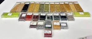 lot 38H image: W - Collection of CB Tubes with Assorted Glass Beads