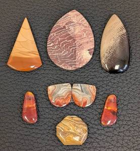 lot 131 image: 8-Piece Natural Stone Cabochons - Assorted Shapes, Largest 2.5 x 1.75 in