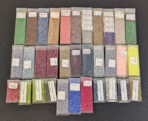 lot 144 image: Seed Beads - 33 Tubes - TOHO Treasures - Assorted Colors