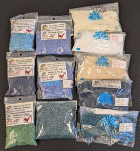 lot 198 image: Toho Seed Beads 110 100g Pack - Assorted Colors (11 Packs)