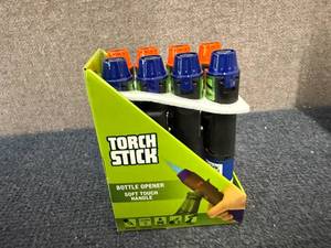 lot 69 image: 8 Torch Sticks With Bottle Opener
