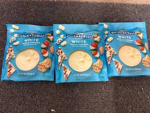 lot 214 image: 3 Bags Of Ghiradelli White Chocolate Melting Wafers