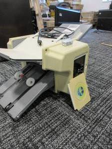 lot 713 image: BL INFINITY SOLUTIONS PRESSURE FOLDER AND SEALER