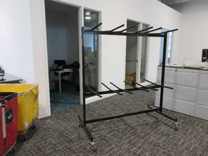 lot 724 image: NATIONAL PUBLIC SEATING FOLDING CHAIR STORAGE AND TRANSPORT RACK