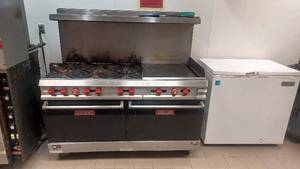 lot 2100 image: VULCAN GAS RANGE WITH GRIDDLE AND 2 OVENS