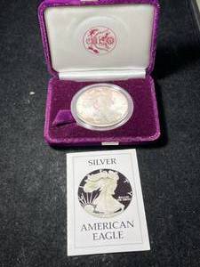 lot 63 image: 1986 PROOF AMERICAN SILVER EAGLE IN ORIGINAL MINT BOX