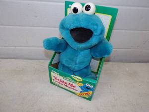 lot 13 image: Tickle me Cookie Monster still in box