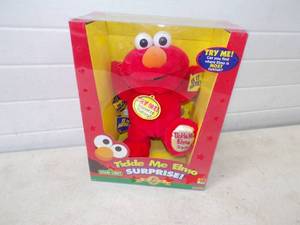 lot 14 image: Tickle Me Elmo Surprise Still in box