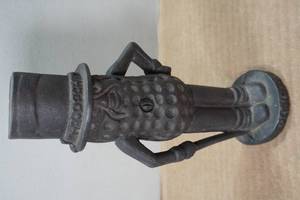 lot 53 image: Vintage Cast Iron Planters Peanuts Coin Bank