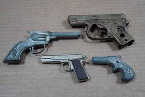 lot 78 image: Vintage Cast Iron Toy Cap Guns