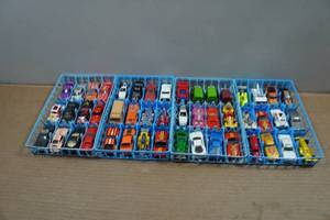 lot 114 image: Hot Wheels Die Cast Cars in Storage Trays