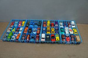 lot 115 image: Hot Wheels Die Cast Cars in Storage Trays